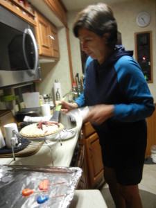 Therese serving the Birthday Berry Pie. 